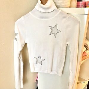 Soft White Ribbed turtleneck with Mesh Star Design
